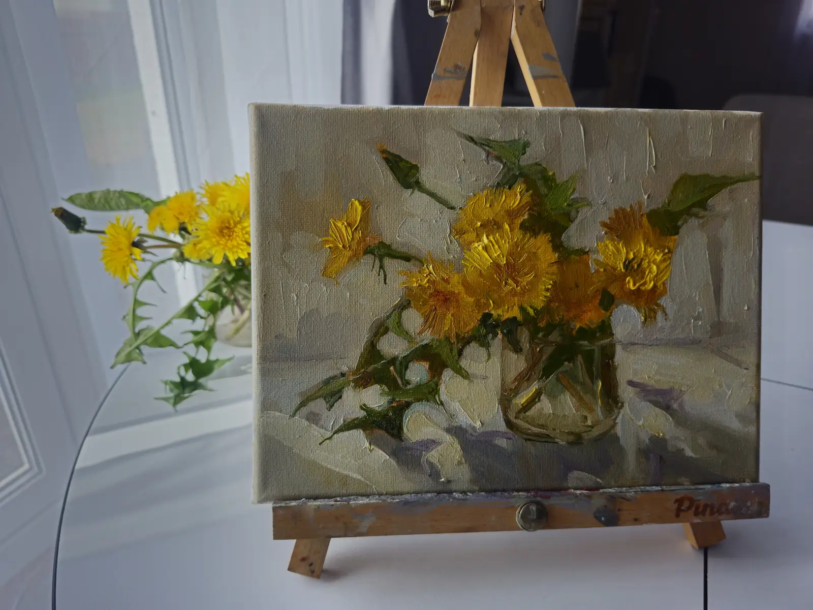 Первые одуванчики